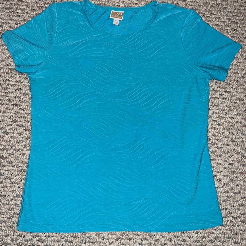 Petite woman's turquoise short sleeve top